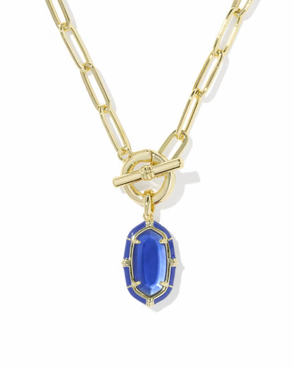 Elisa Gold Enamel Link and Chain Necklace in Cobalt Illusion by Kendra Scott: gold link chain, toggle closure, oval cobalt blue gemstone pendant in gold frame. Available in 16″, 18″, and 20″ lengths.