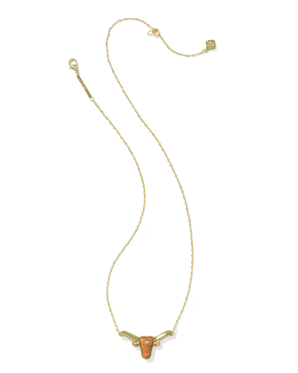Longhorn Gold Short Pendant Necklace by Kendra Scott, 14k gold with a bull’s head pendant featuring orange details and gold-tone horns. Available in 16″ and 18″ lengths.