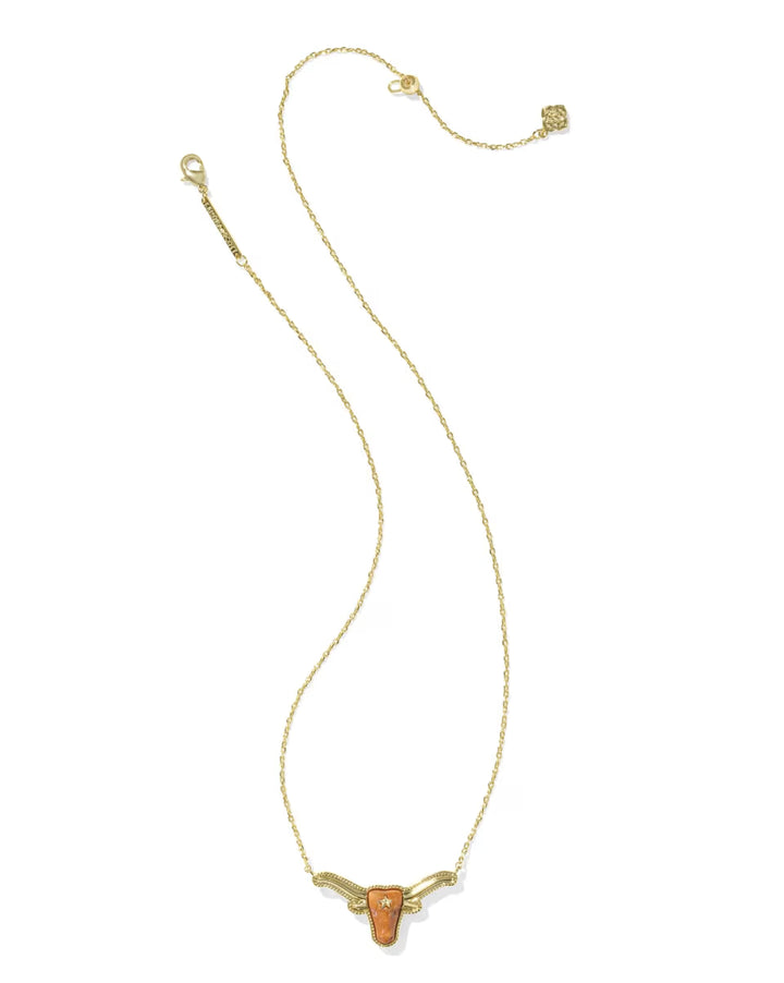 Longhorn Gold Short Pendant Necklace by Kendra Scott, 14k gold with a bull’s head pendant featuring orange details and gold-tone horns. Available in 16″ and 18″ lengths.