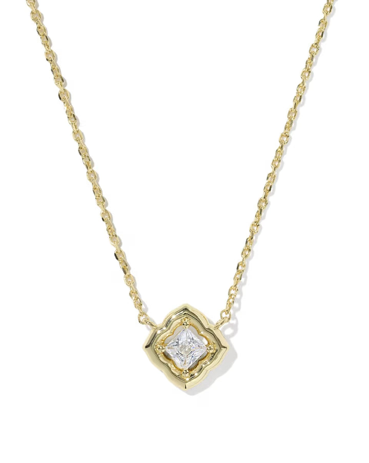 Square gold pendant necklace with central white CZ stone in a decorative frame. Simple, delicate design. Available in short lengths.