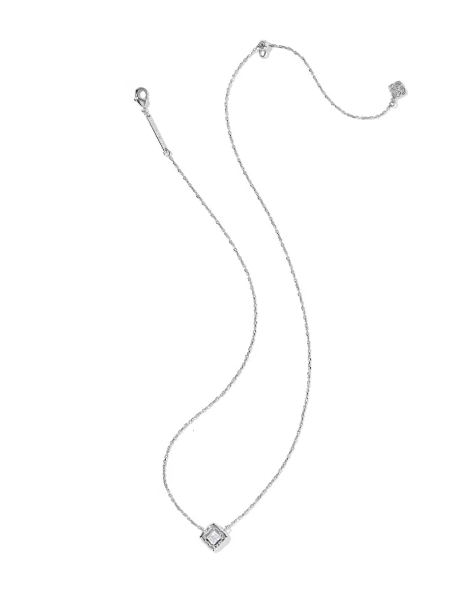 Silver-toned chain necklace with a small square white CZ pendant, adjustable length, and lobster clasp; available in short sizes.