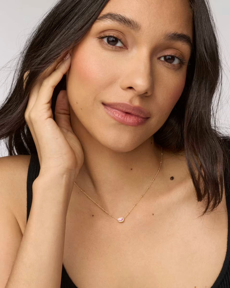 Mini Elisa Gold Satellite Short Pendant Necklace in Azalea Illusion by Kendra Scott, available in 15-17 inch adjustable lengths.
