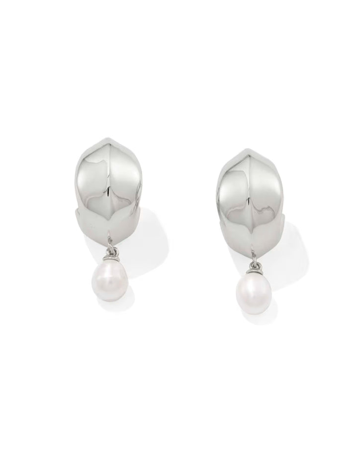 Oakland Pearl Silver Huggie Earrings by Kendra Scott: polished silver huggies with rounded tops and a single white freshwater pearl drop. Available in one size.