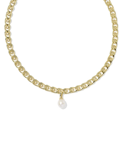 The Oakland Pearl Gold Chain Necklace by Kendra Scott has oval gold chain links and a white freshwater pearl pendant at the center. Available in multiple sizes.