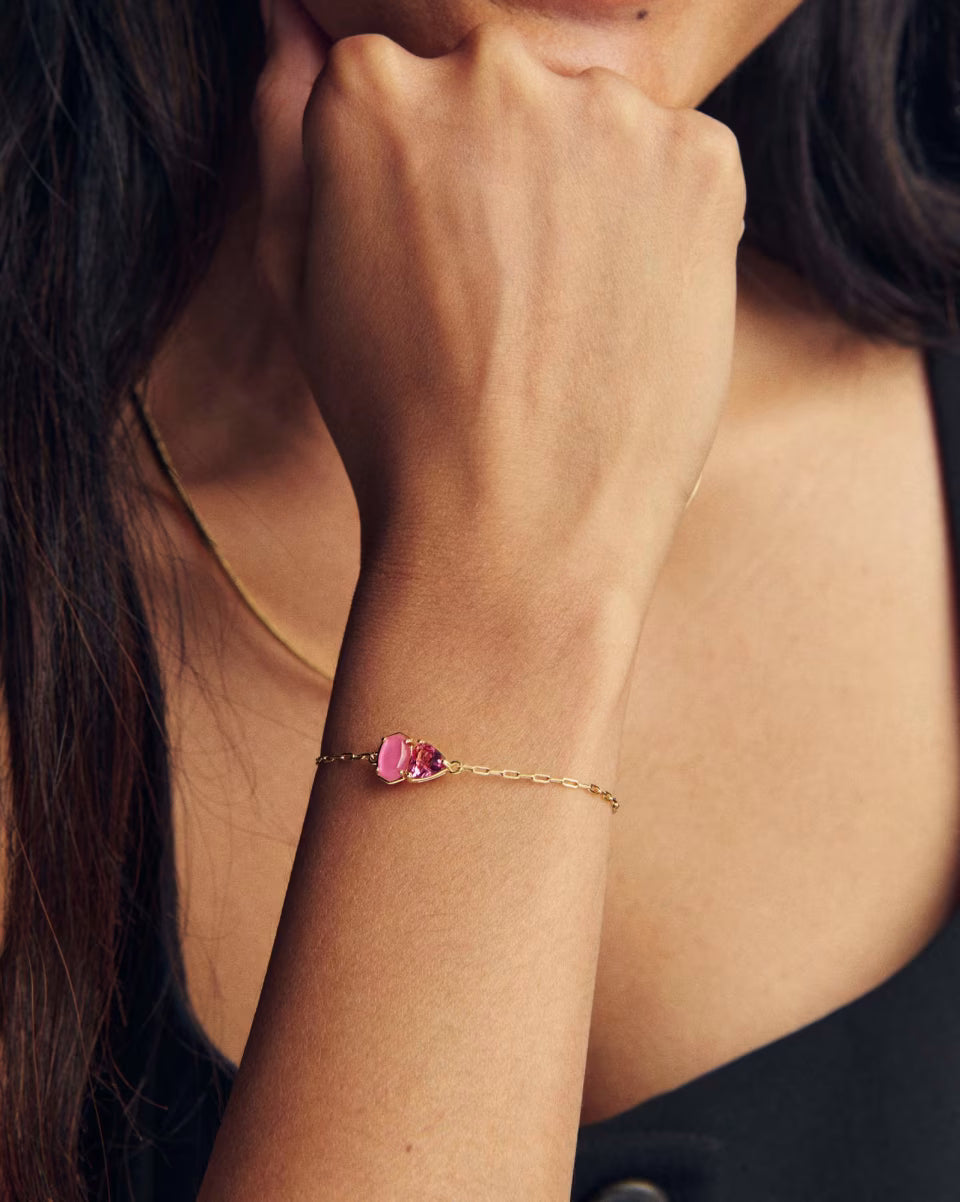 Tatum Gold Delicate Chain Bracelet in Pink Mix by Kendra Scott, shown on wrist. Available in small, medium, and large sizes.