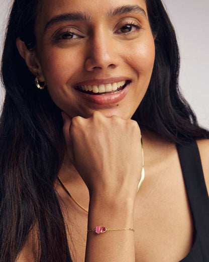 Tatum Gold Delicate Chain Bracelet in Pink Mix by Kendra Scott, 14k gold with October birthstone; available in S/M and M/L sizes.