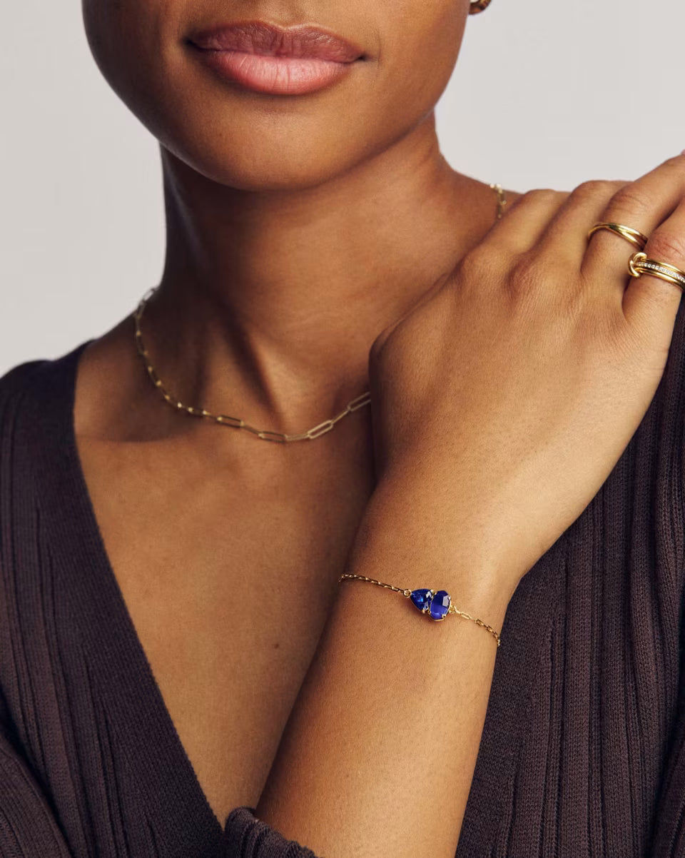 Tatum Gold Delicate Chain Bracelet in Cobalt Mix by Kendra Scott: gold chain with blue gemstones, available in sizes S/M and M/L.