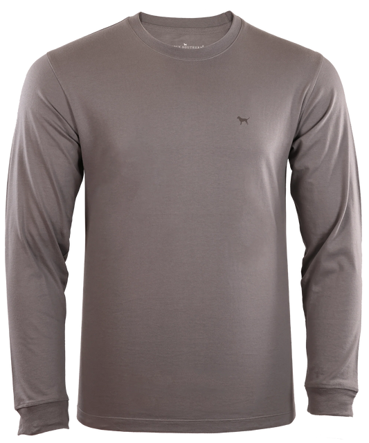 Sentence using the product name: The Hunt Dog Long Sleeve T-Shirt is a plain long-sleeve, charcoal gray 100% cotton shirt with a small logo on the chest, displayed against a transparent background. The shirt features a crew neckline and a slim fit design.