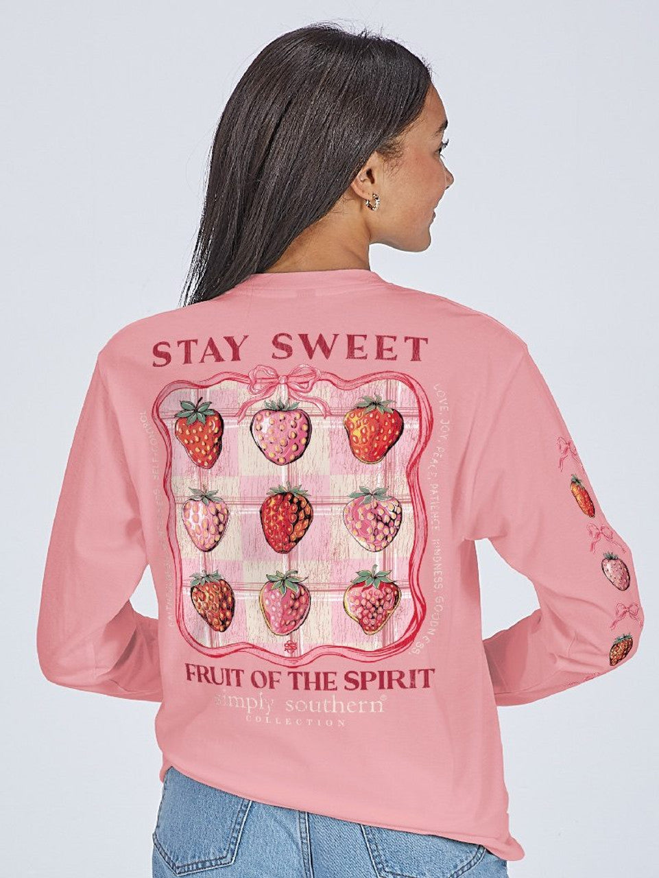 Stay Sweet Fruit of the Spirit Tearose Pink LS T-Shirt, “STAY SWEET” and “FRUIT OF THE SPIRIT” on back, strawberry on sleeve. Sizes S-XL.