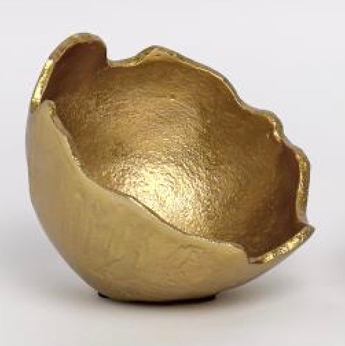 Small, round, gold-colored bowls with organic shape and jagged edges. Available in two sizes: 14cm and 19cm.