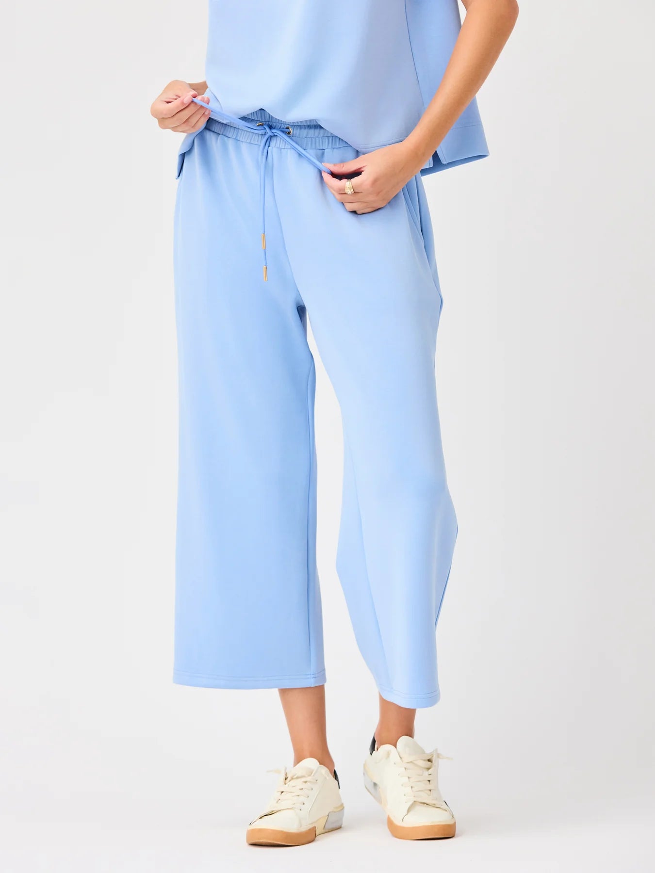 Sabrina Cropped Pants in light blue, elastic drawstring waistband. Sizes: XS-XL.
