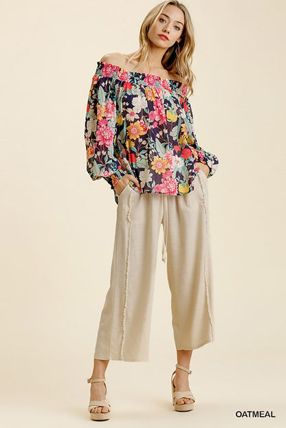 Linen Frayed Edge Wide Leg Pants with Pockets, elastic waistband. Available in sizes XS–XL.