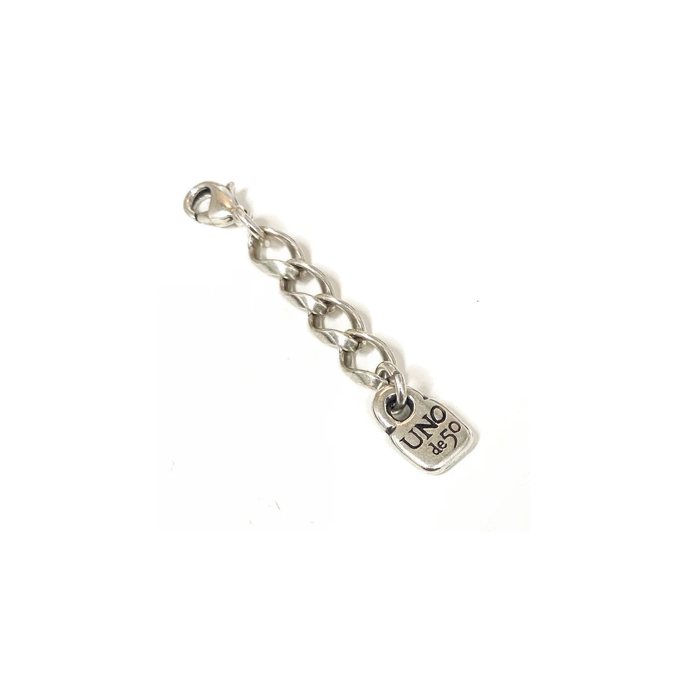 Silver chain link extension with a small square "UNO de 50" engraved pendant; available in multiple sizes for use as bracelet or necklace extender.