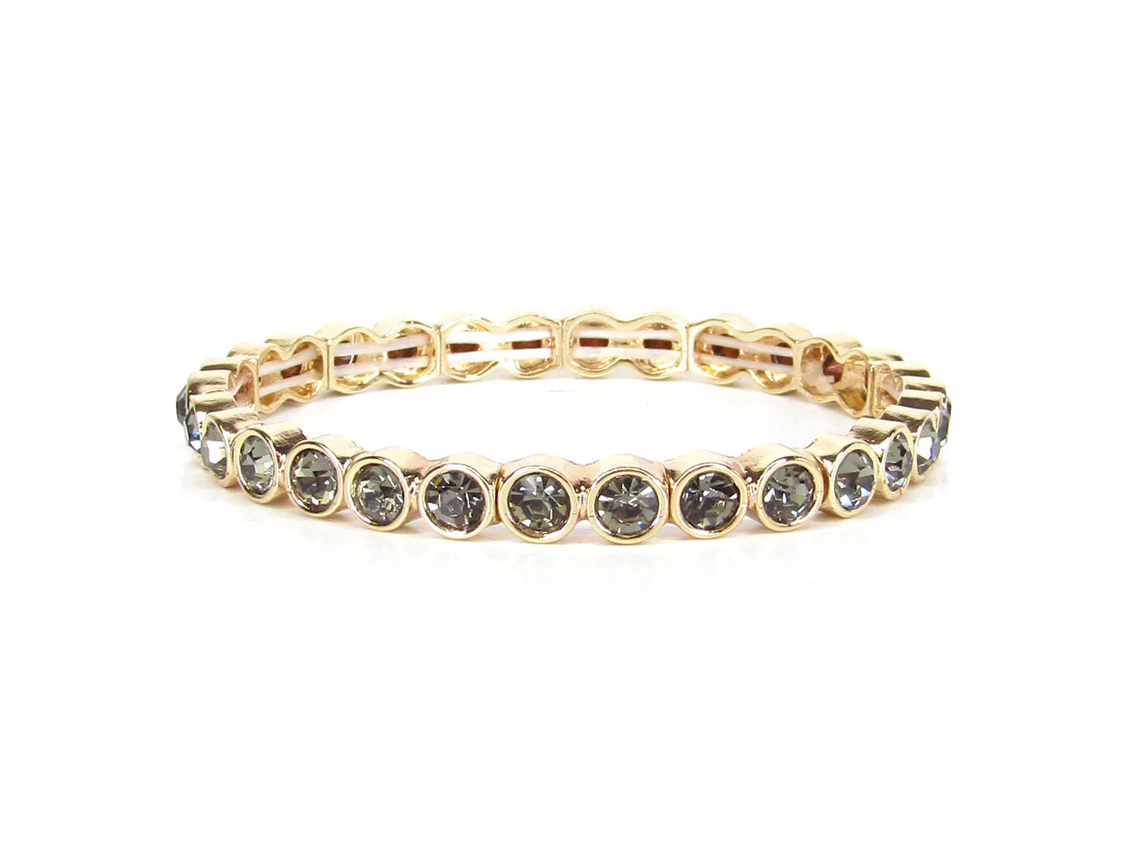 Morgan Gold Crystal Stone Stretch Bracelet with round, bezel-set dark stones in a continuous gold setting; available in sizes S/M and M/L.
