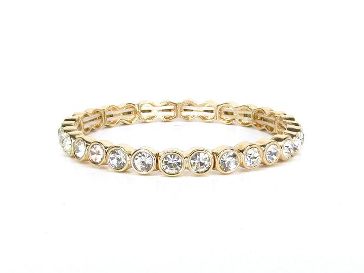 Morgan Gold Crystal Stone Stretch Bracelet featuring a row of round clear crystals in bezel settings. Available in multiple sizes.