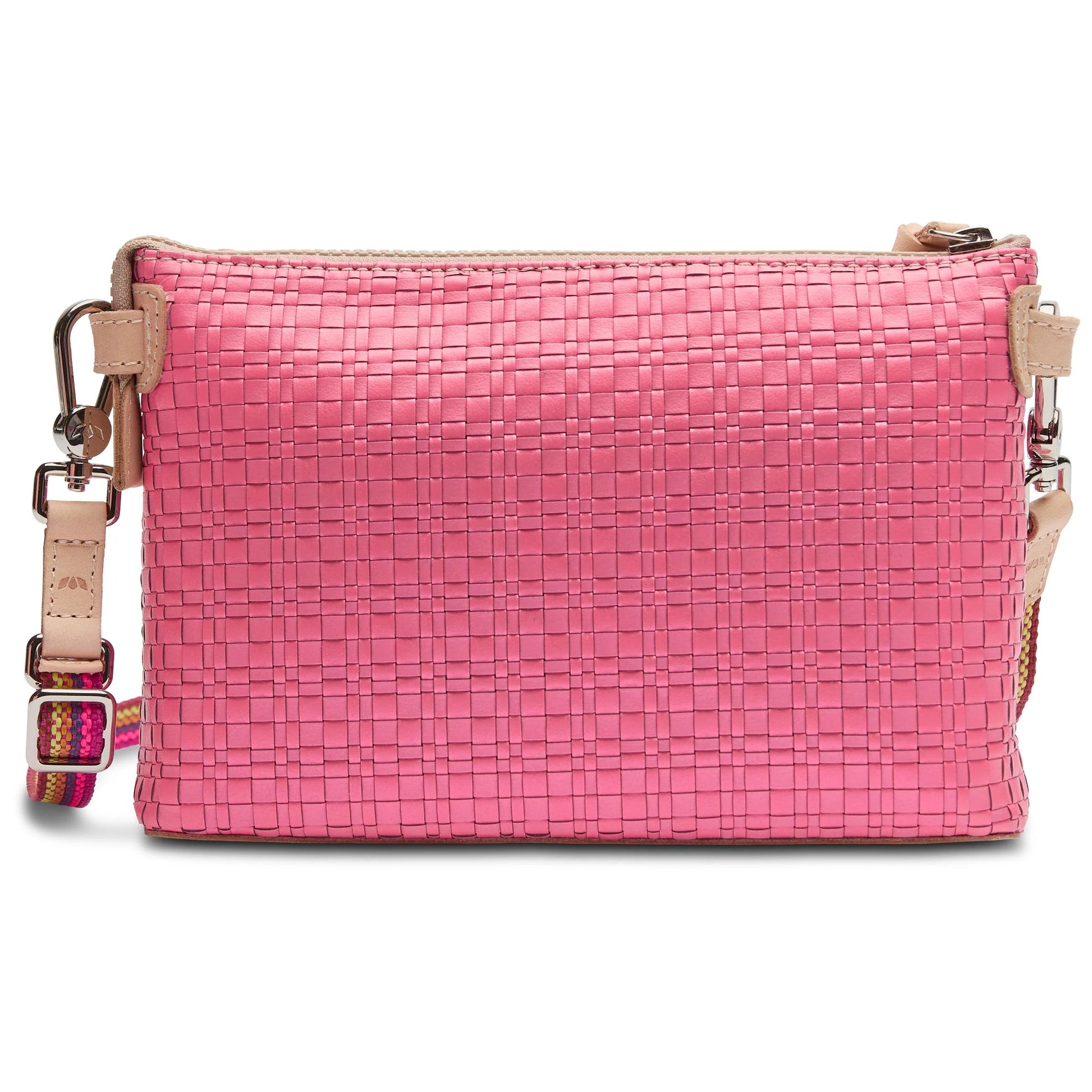 The Midtown Crossbody, Pink: small woven-texture bag with beige leather accents, zipper closure, and adjustable strap featuring a colorful woven pattern. Available sizes: Small, Medium.
