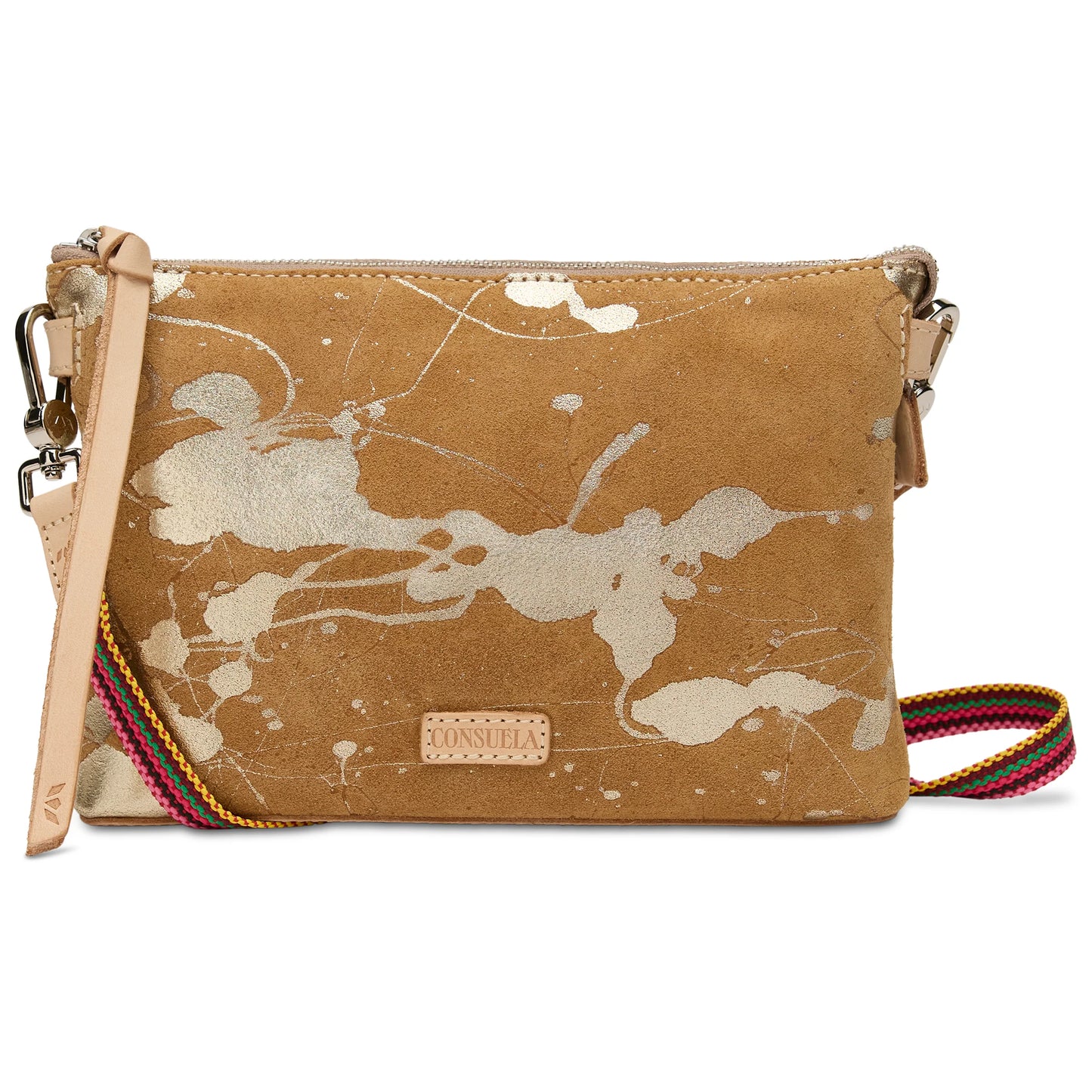 Tan suede Midtown Crossbody, Marlow with metallic silver splatter, leather zipper pull, and adjustable crossbody strap. Available in sizes small and medium.