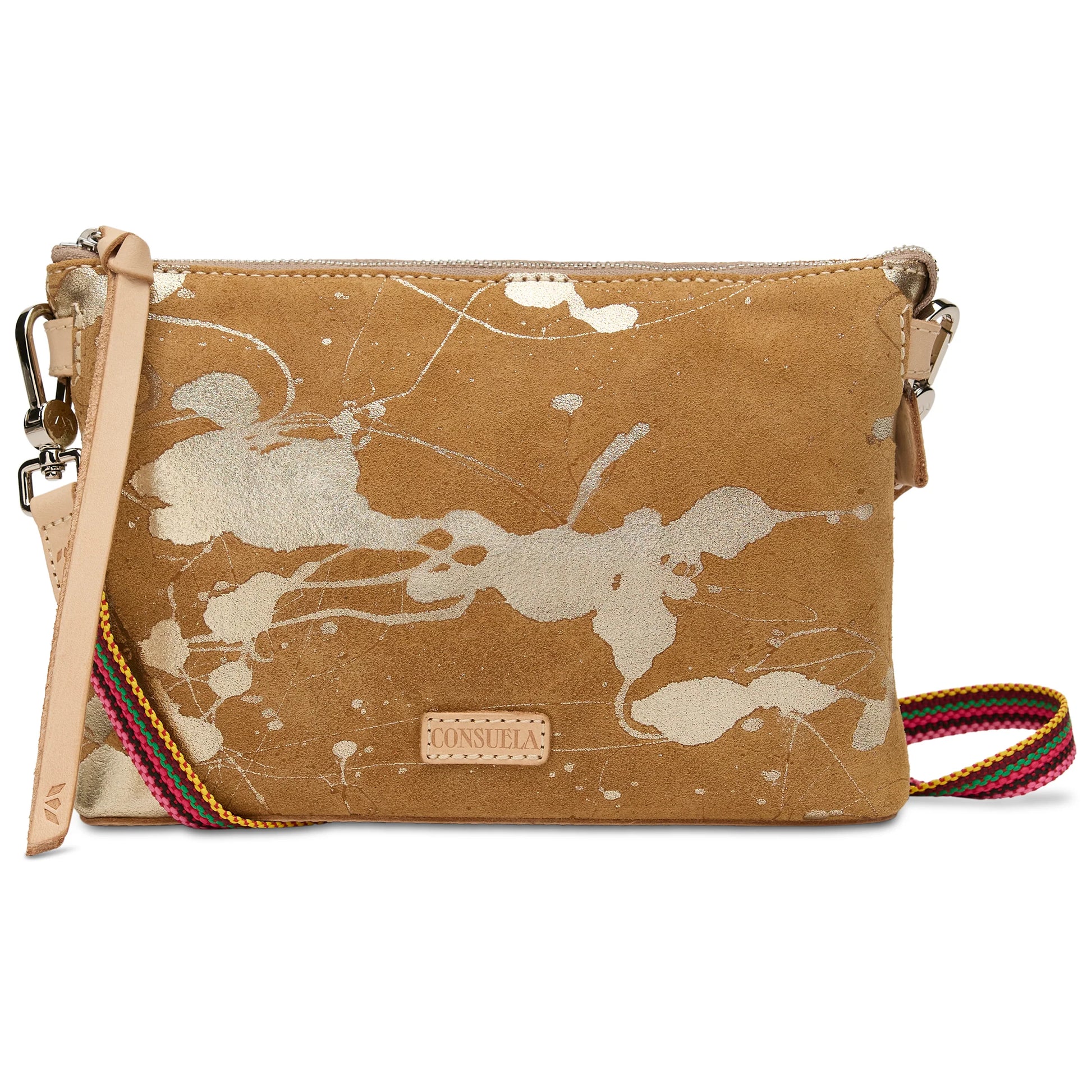 Tan suede Midtown Crossbody, Marlow with metallic silver splatter, leather zipper pull, and adjustable crossbody strap. Available in sizes small and medium.