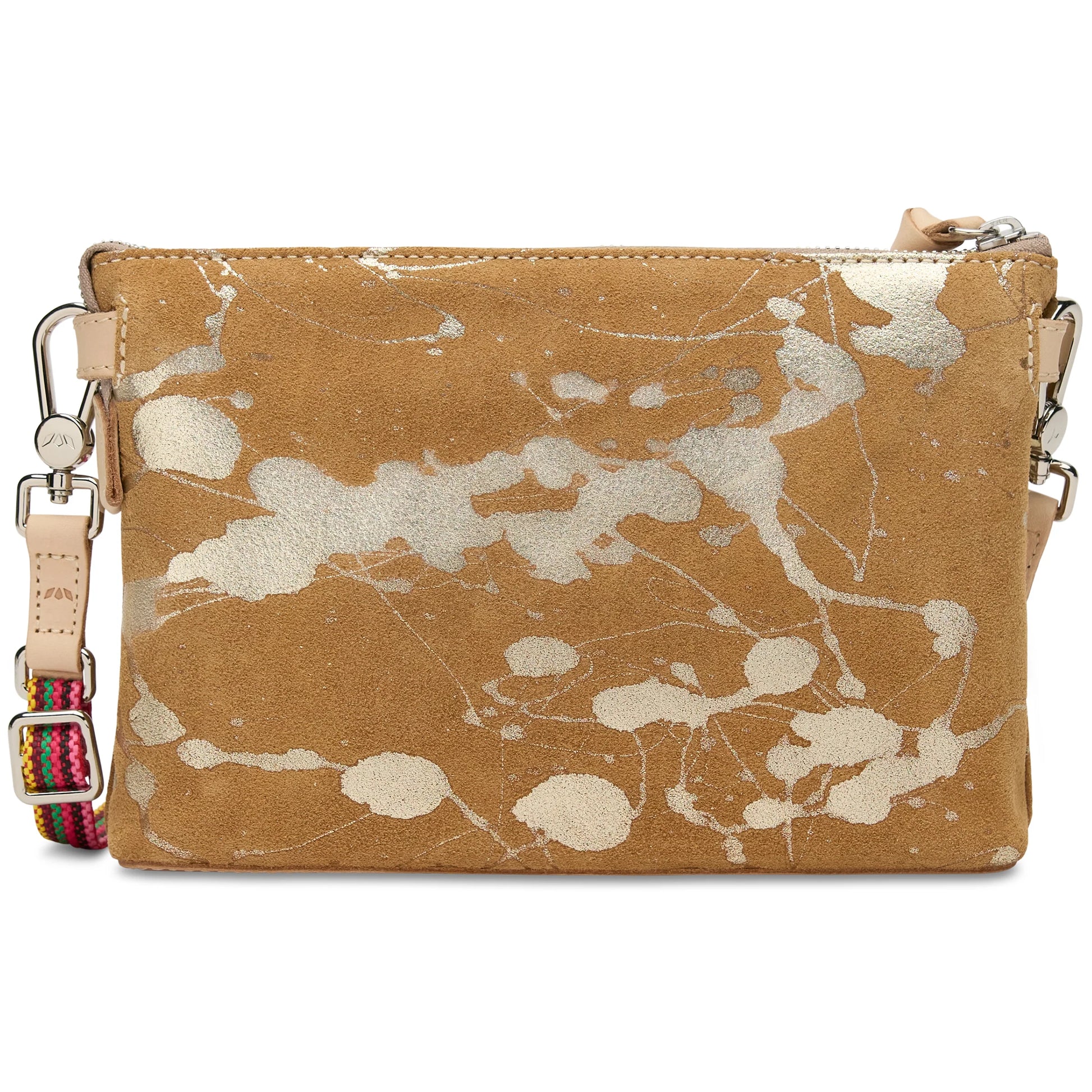 Tan suede crossbody bag with white paint splatter, silver zipper, light tan leather pull, and colorful striped adjustable strap. Available sizes: small, medium, large.
