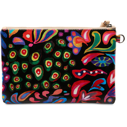 The Mighty Pouch, Sophie is a colorful clutch bag with abstract multicolored floral and dotted patterns on black, featuring a top zipper with tan pull and a metal ring for use as a keyring pouch. Sizes available: Small, Medium, Large.