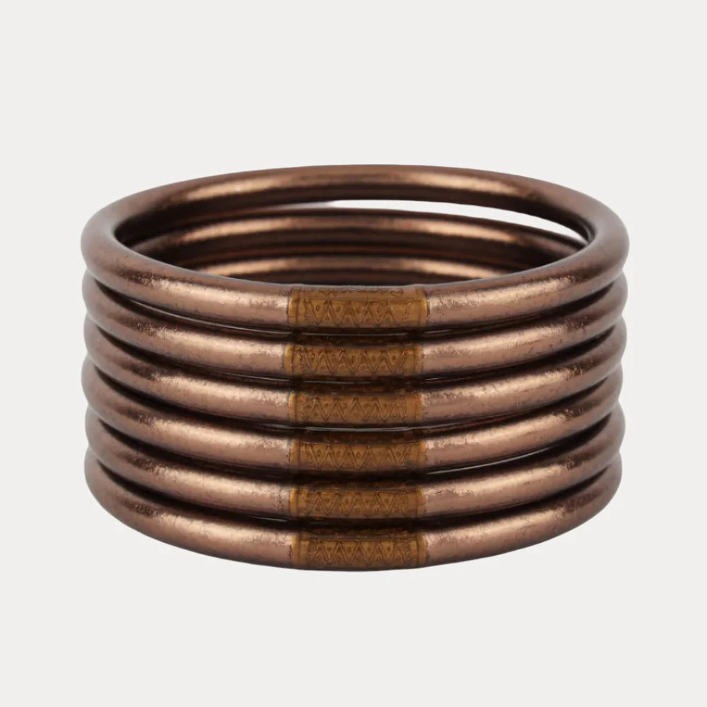 Set of six Meteorite All Weather Bangles® in large with metallic bronze finish and subtle center bands. Available in multiple sizes.