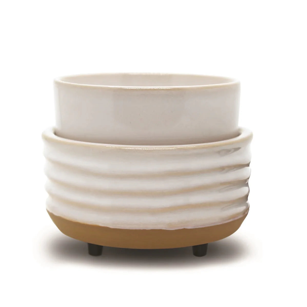 The Candle & Wax Warmers Set features a white ceramic planter with a ribbed texture on a tan base, accented by small black feet for modern elegance.