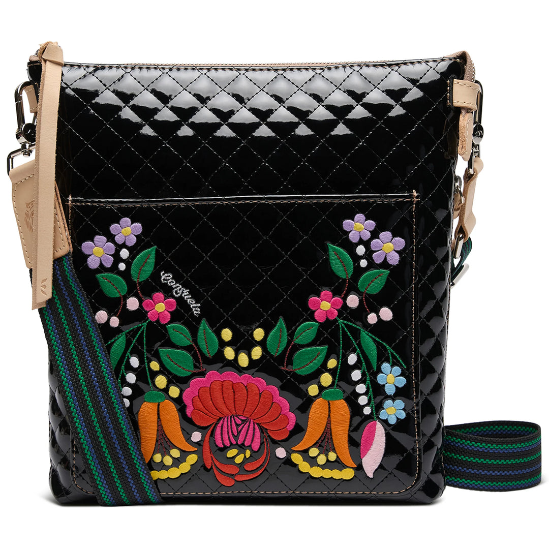 Black quilted crossbody with floral embroidery, beige accents, green-blue strap. Available sizes: S, M, L.