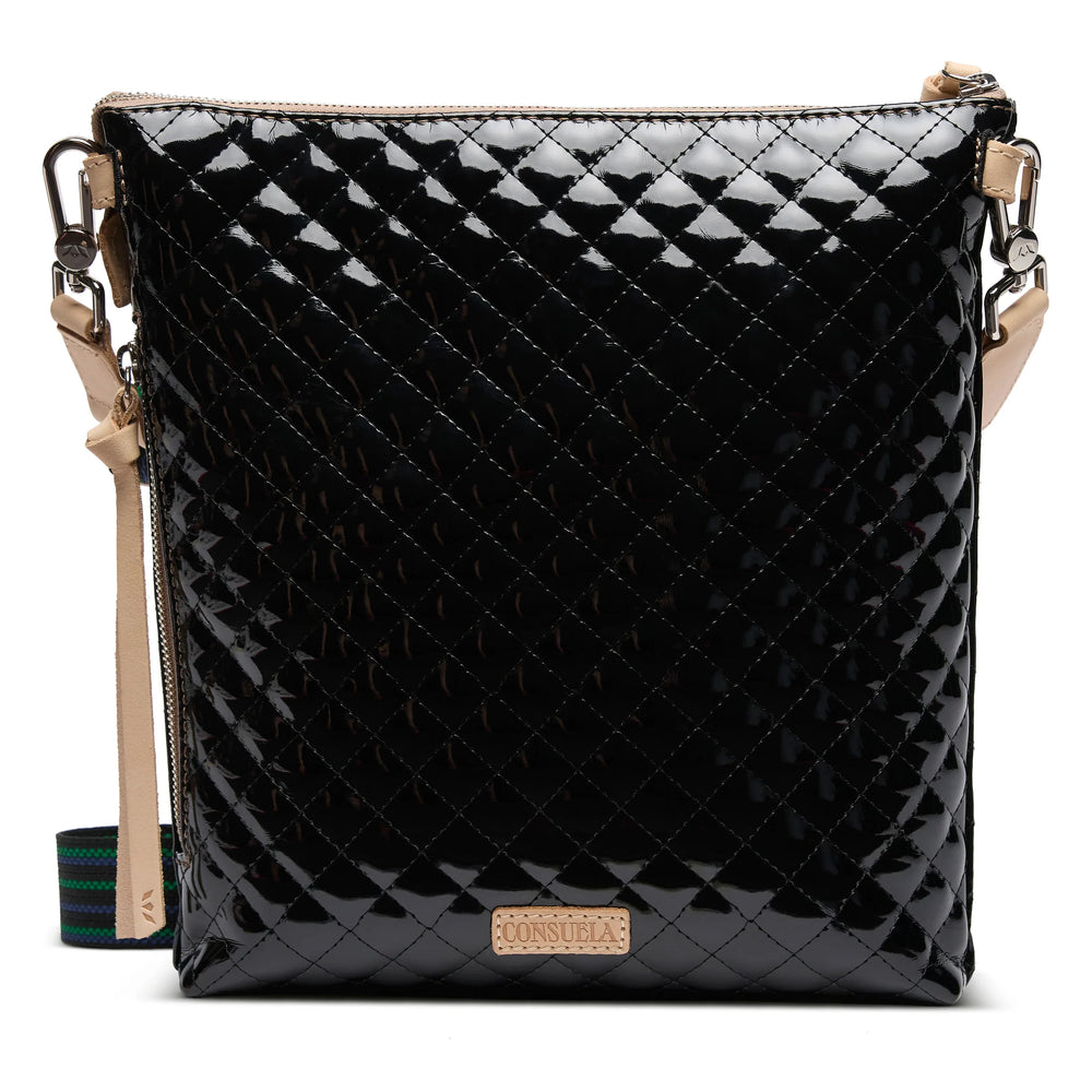 Black glossy quilted crossbody with beige leather straps, gold logo plate, colorful strap accents. Available in multiple sizes.