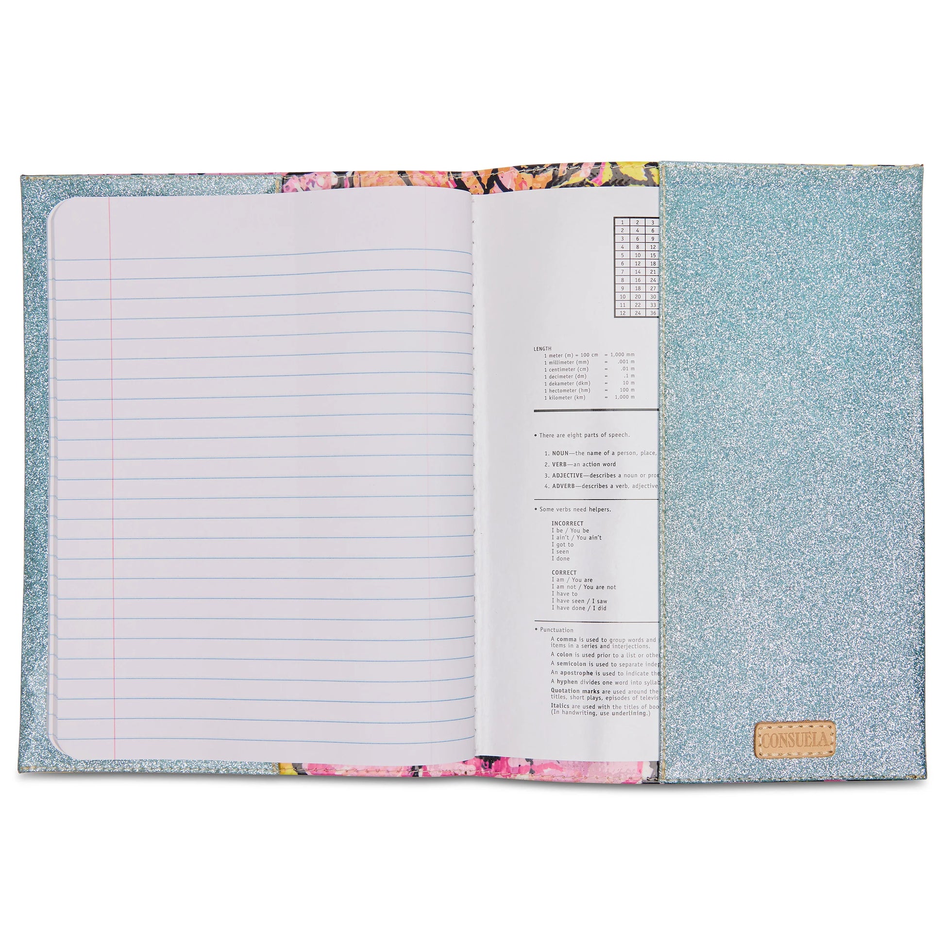 The Consuela Notebook - Lily features a glittery blue ConsuelaCloth™ exterior and a vibrant floral edge on its reusable cover. Inside, lined pages are on the left with printed text on the right. Available in one size.