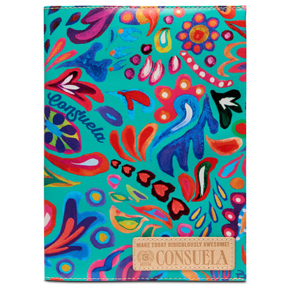 Consuela Notebook, Tasha: a composition notebook with colorful abstract floral designs on a turquoise cover, tan embossed patch reads “Make Today Ridiculously Awesome! Consuela.” Available in standard size.