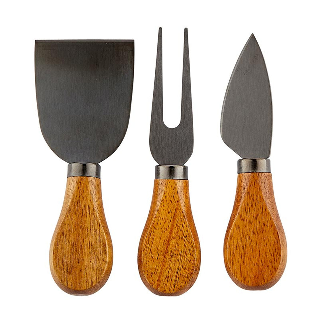 Here for the Charcuterie" Wood Handle Cheese Knives Book Box includes three cheese knives with acacia handles: flat spatula-style knife, two-pronged fork, and pointed blade. Handles are smooth and rounded. Sizes available: One Size.