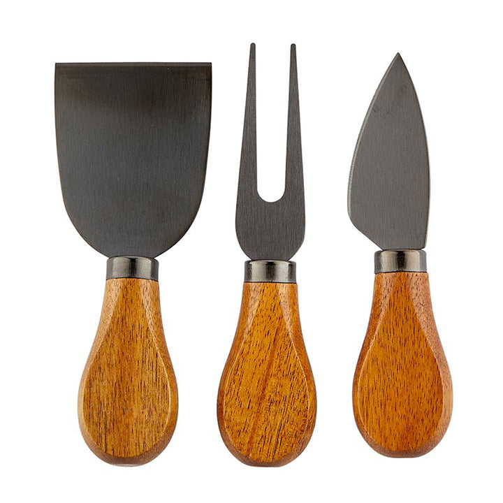 Here for the Charcuterie" Wood Handle Cheese Knives Book Box includes three cheese knives with acacia handles: flat spatula-style knife, two-pronged fork, and pointed blade. Handles are smooth and rounded. Sizes available: One Size.