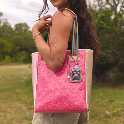 Large, glittery pink Chica Tote, Bae with rainbow straps and attached digital device keychain; multi-functional design. Available in large size.