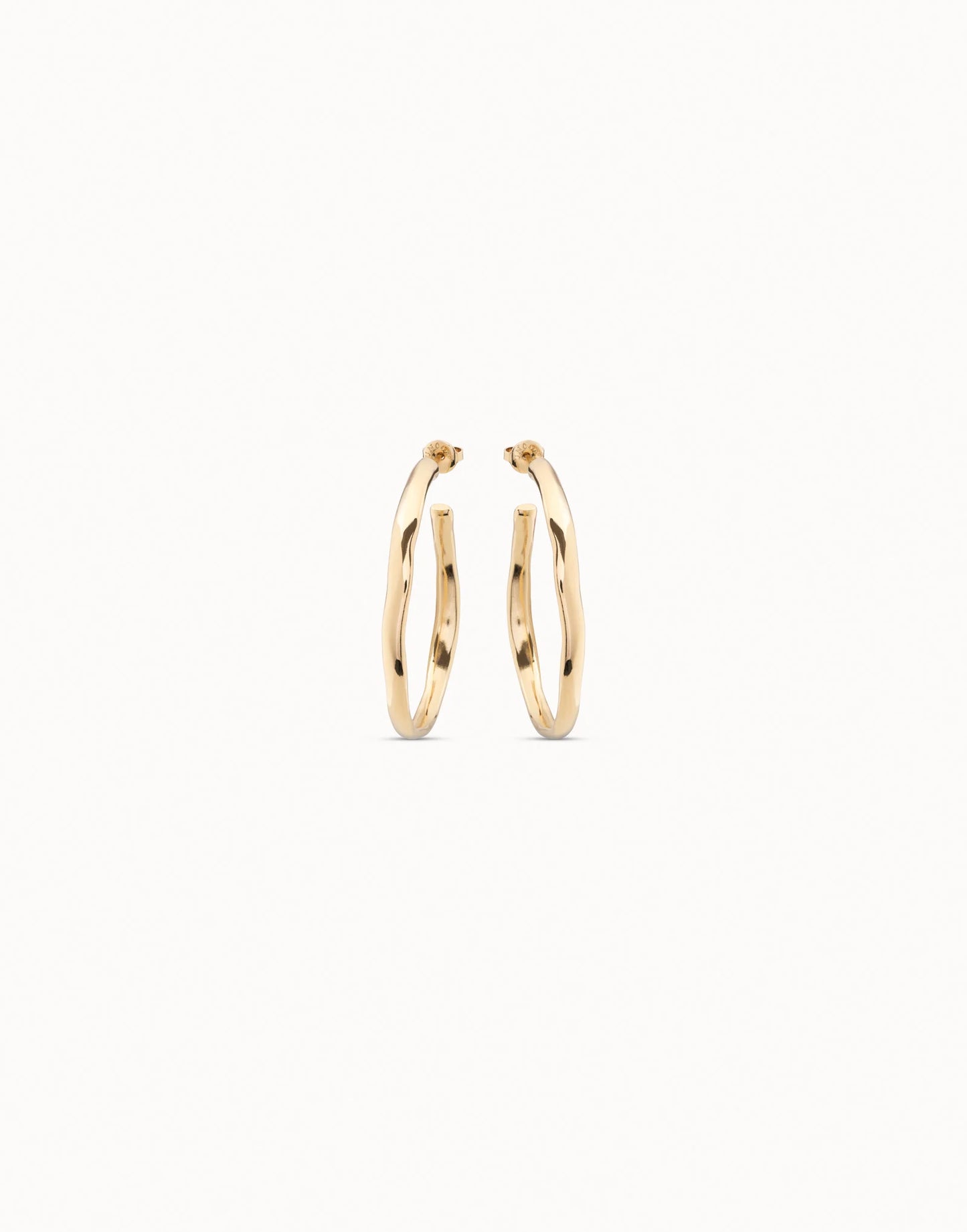 18K gold-plated open hoop earrings with a simple, elegant design, available in multiple sizes.