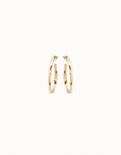 18K gold-plated open hoop earrings with a simple, elegant design, available in multiple sizes.