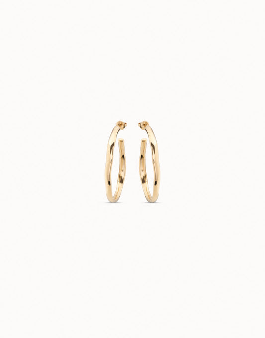 18K gold-plated open hoop earrings with a simple, elegant design, available in multiple sizes.