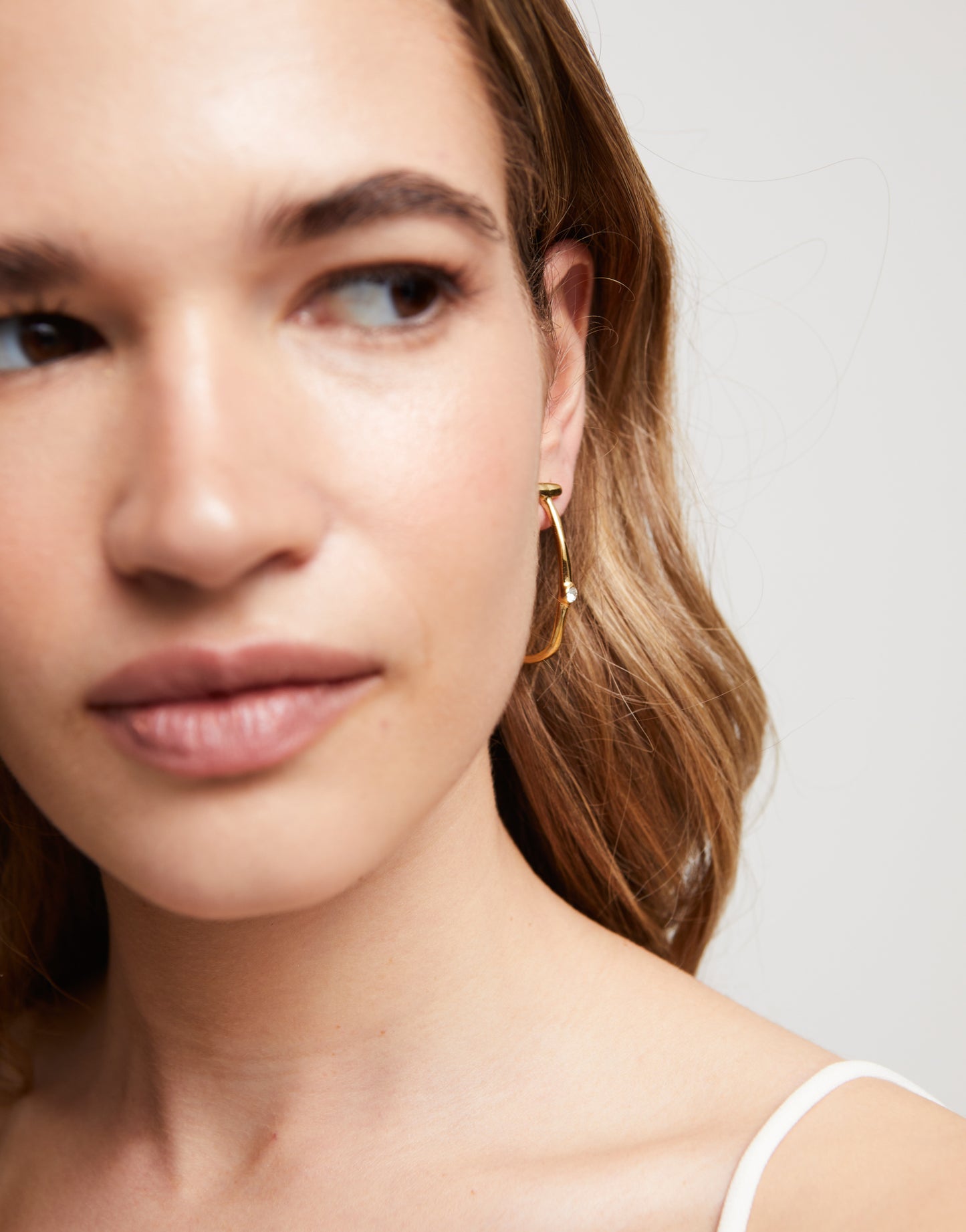 Hoop Earrings with White Topaz, available in small, medium, and large sizes.