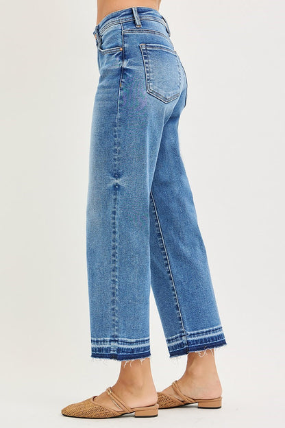 Risen Medium Wash Cropped Boyfriend Jeans, available in sizes 24–32.