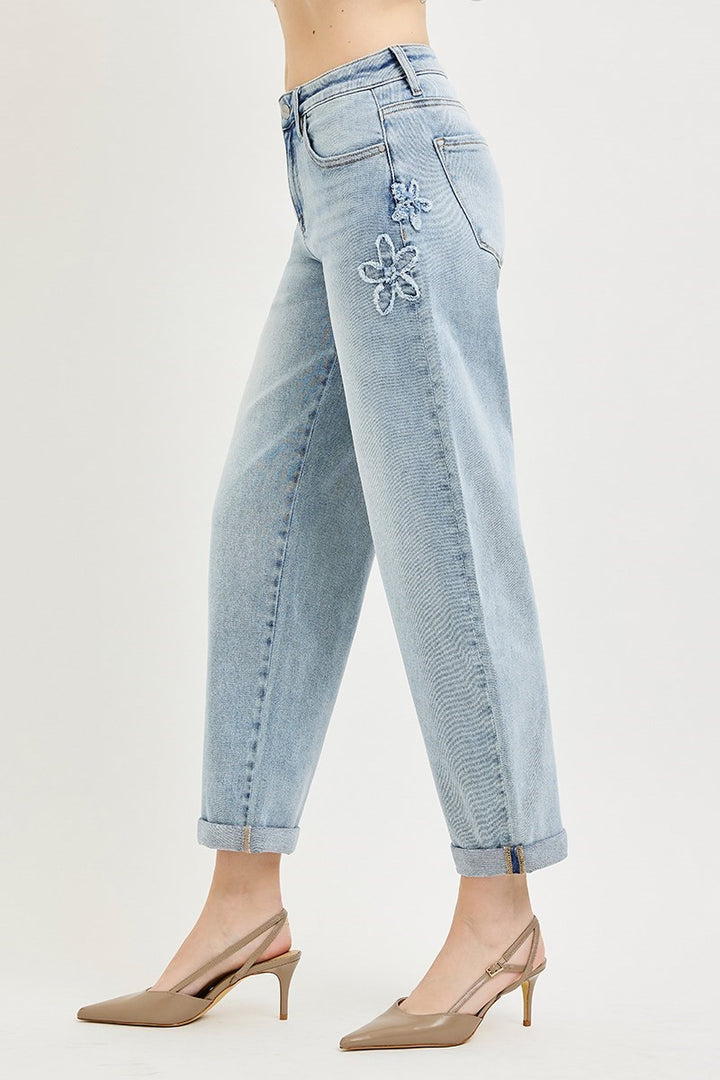 Risen Flower Patch Crop Barrel Jeans in light-wash denim with embroidered thigh flowers. Available in sizes 24-32.