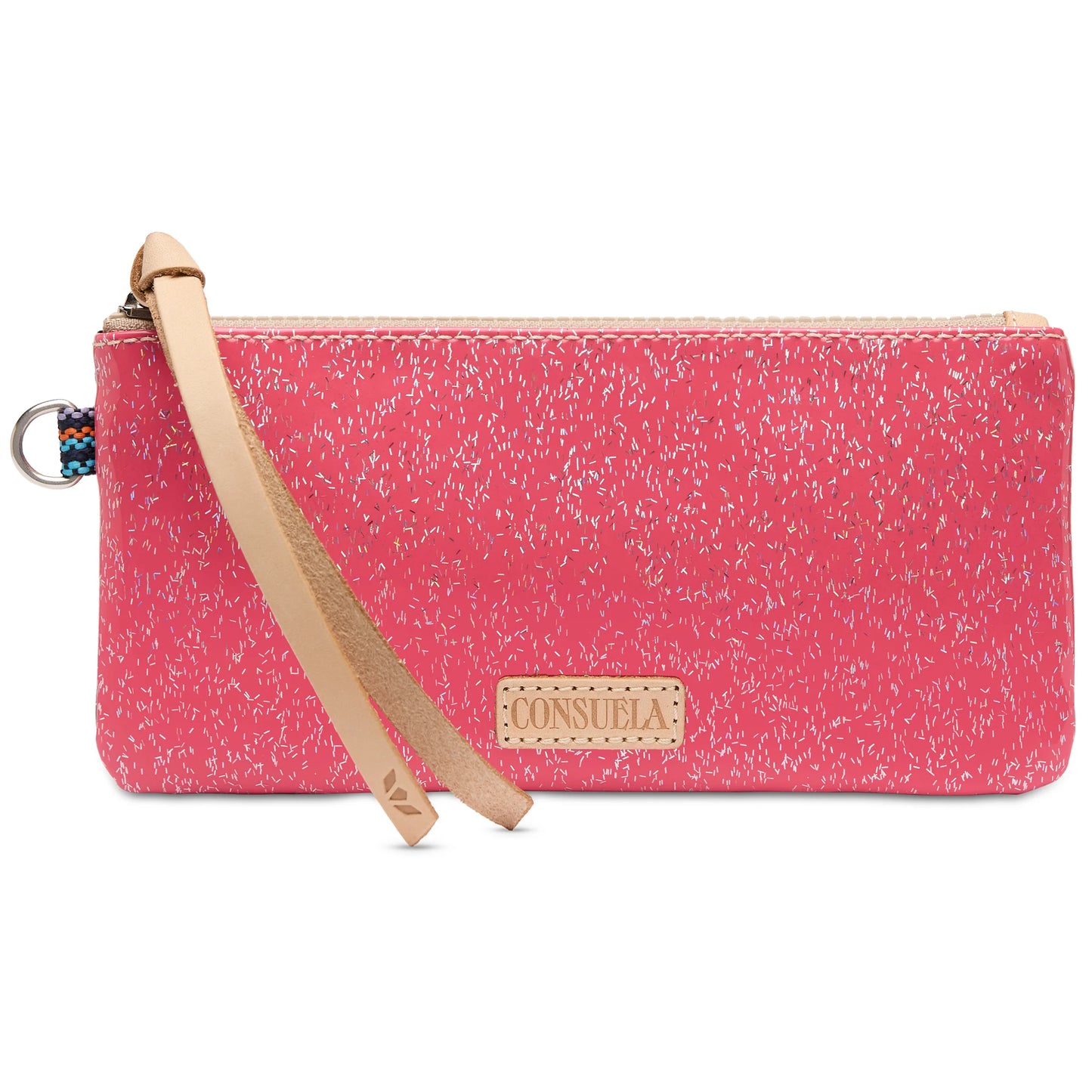 Vibrant pink wristlet with white speckles, tan leather strap, “Consuela” front label, glittery finish, top zipper closure, and keyring attachment. Sizes available.