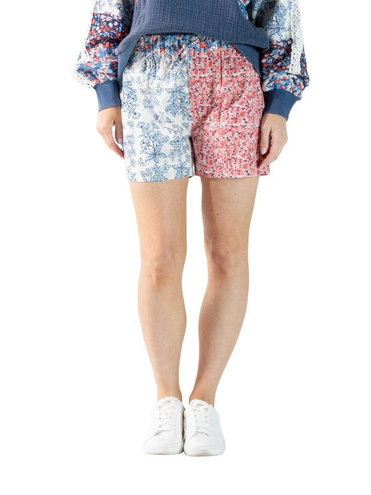 Americana Floral Shorts with blue and red floral patterns. Available in sizes XS–XL.