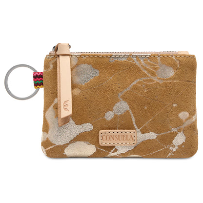Marlow Pouch: Small tan suede wallet with light paint splatters, leather zipper pull, multicolored fabric accent, silver keyring, and front “CONSUELO” patch. Compact card organizer. Size availability not specified.
