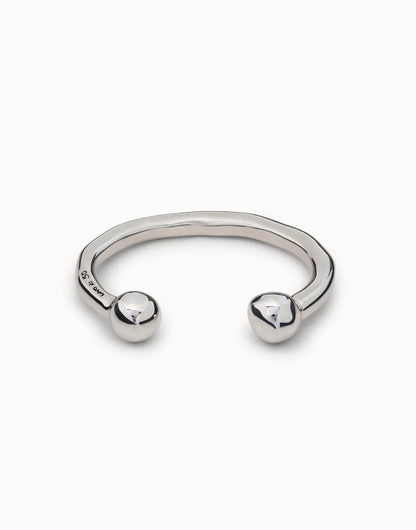 Handmade sterling silver open cuff bangle with a wavy design and smooth round ball ends. Available in multiple sizes.