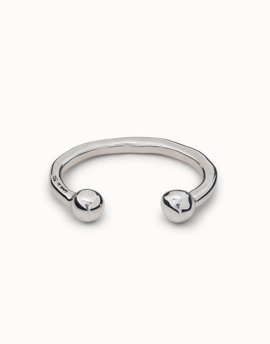 Handmade sterling silver open cuff bangle with a wavy design and smooth round ball ends. Available in multiple sizes.