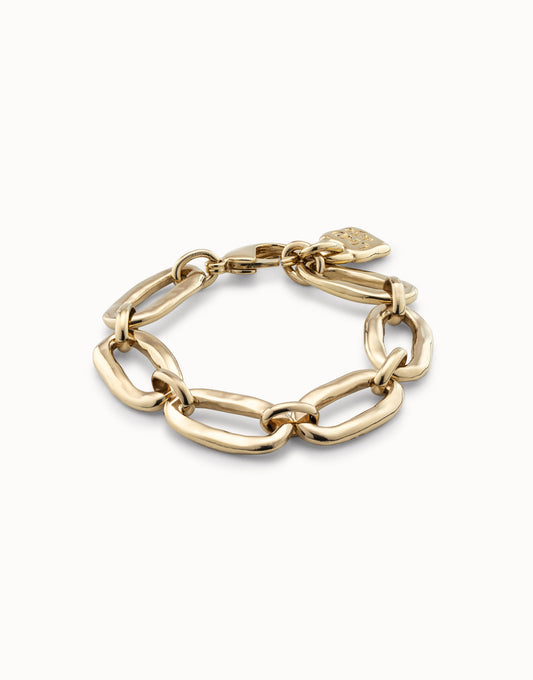 Gold Bracelet with chunky, handmade oval links and a small heart-shaped charm near the clasp by UNOde50; available in multiple sizes.