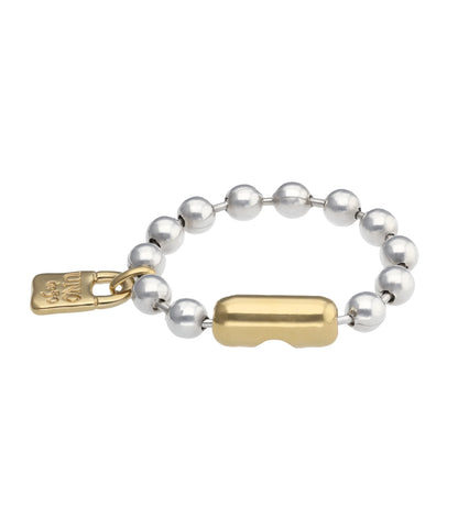 Beaded bracelet with silver round beads, a gold cylindrical centerpiece, and a small rectangular padlock charm; available in multiple sizes.