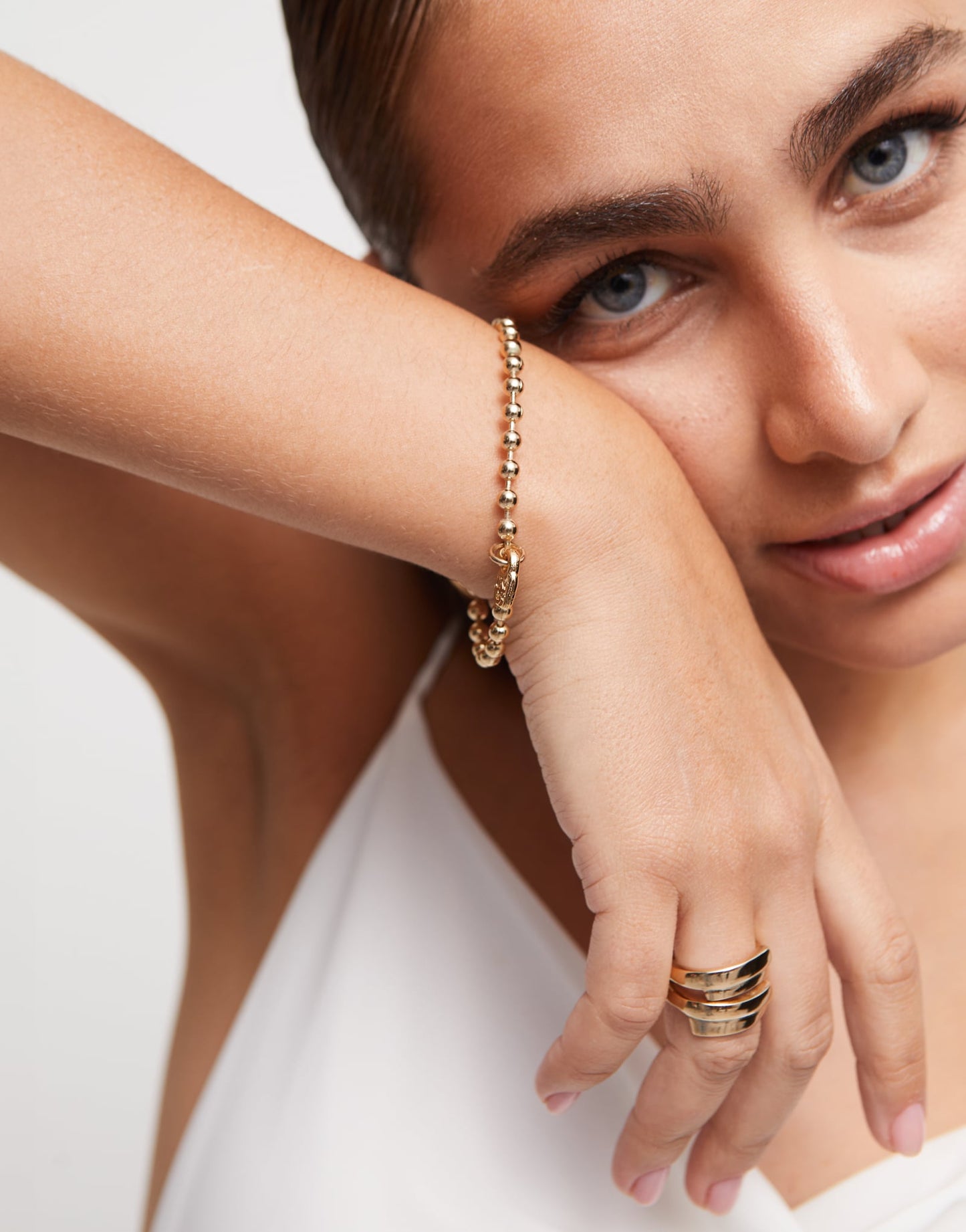 Beaded Charm Bracelet by UNOde50, handmade in Spain, available in sizes S, M, and L.