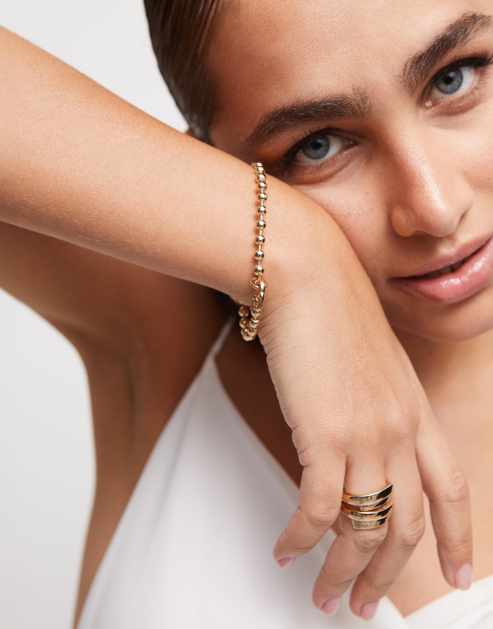 Beaded Charm Bracelet by UNOde50, handmade in Spain, available in sizes S, M, and L.