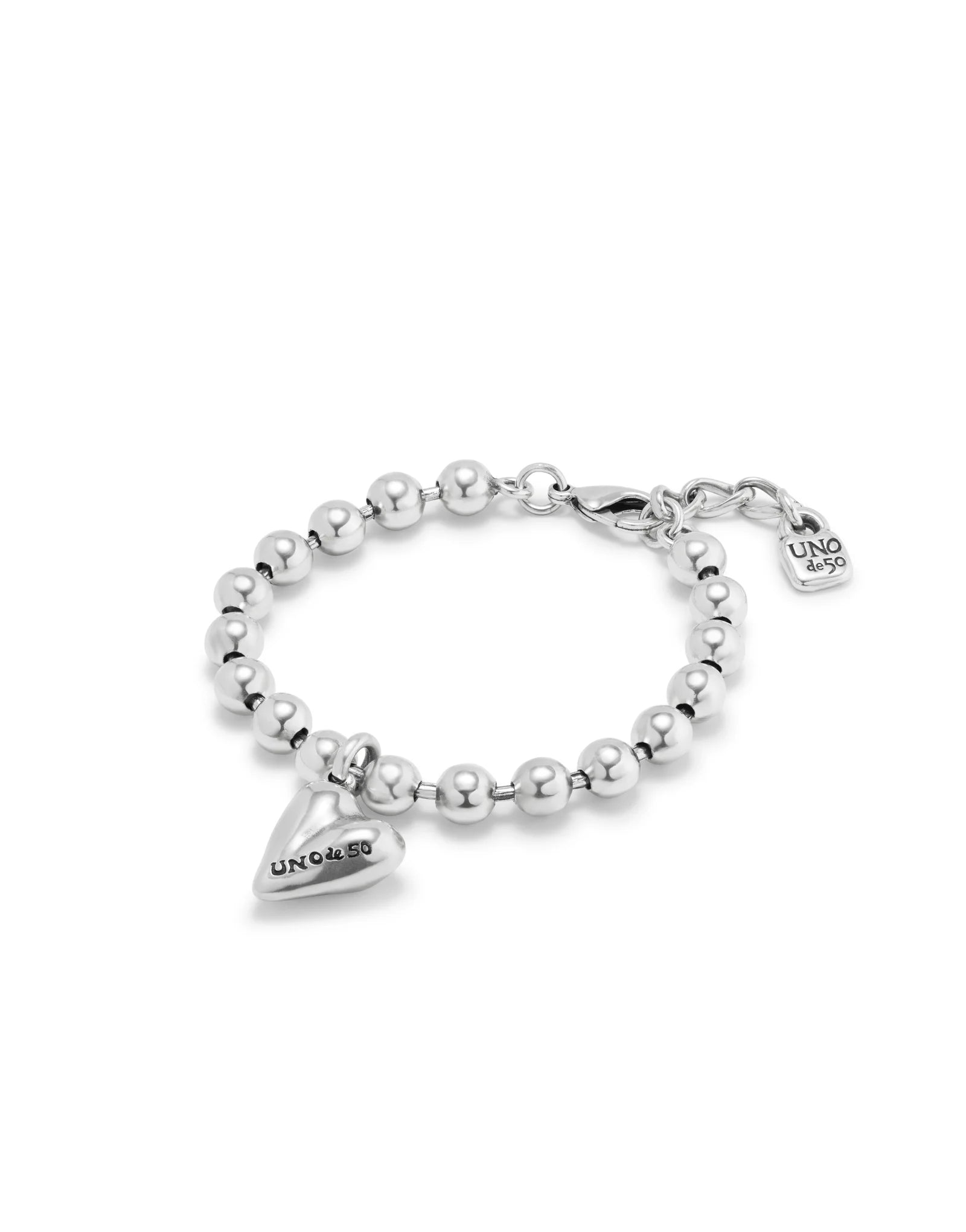 Sterling silver beaded bracelet with two heart-shaped charms engraved "UNO de 50", secure lobster clasp. Available in S, M, L sizes.