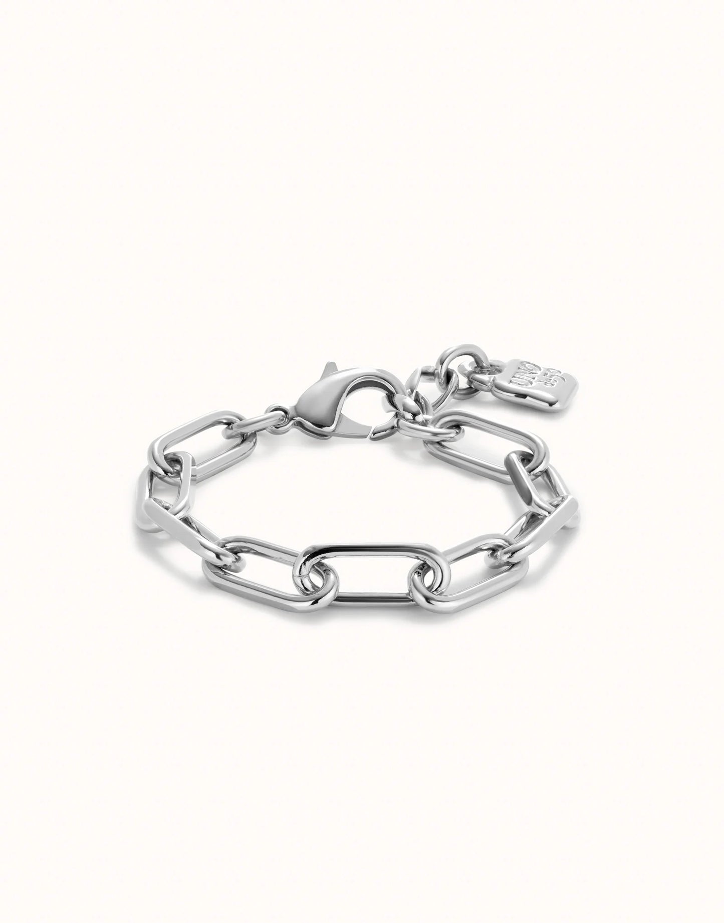 Sterling silver paper clip chain-link bracelet with lobster clasp and small padlock charm, available in multiple sizes.